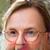 Avatar of a female commenter, Sarah L.