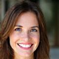 Sarah M., 42, smiling contentedly